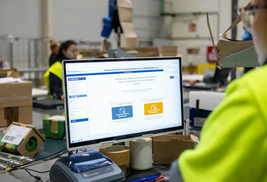 Operator checking incoming goods on screen