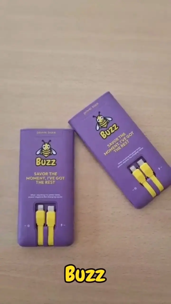 Two Buzz power banks with their built-in cables
